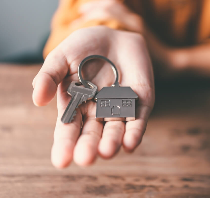 hand holding rental property keys